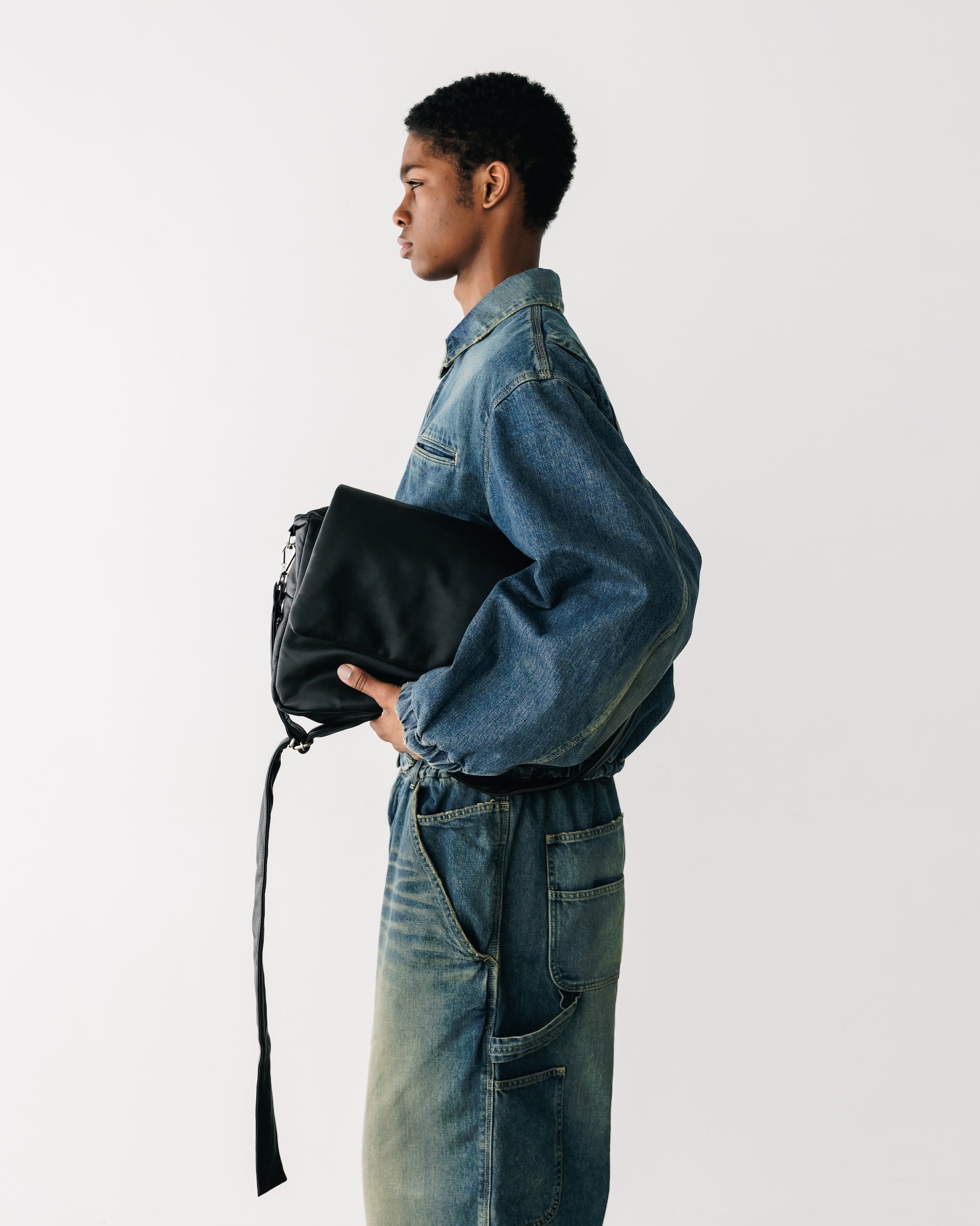 CLESSTE LEATHER PADDED FLAP HOLIDAY BAG