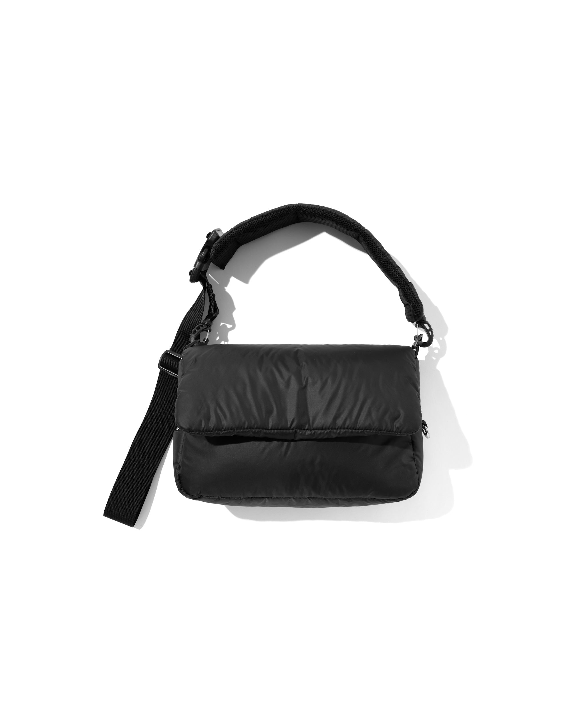 CLESSTE PADDED FLAP HOLIDAY BAG