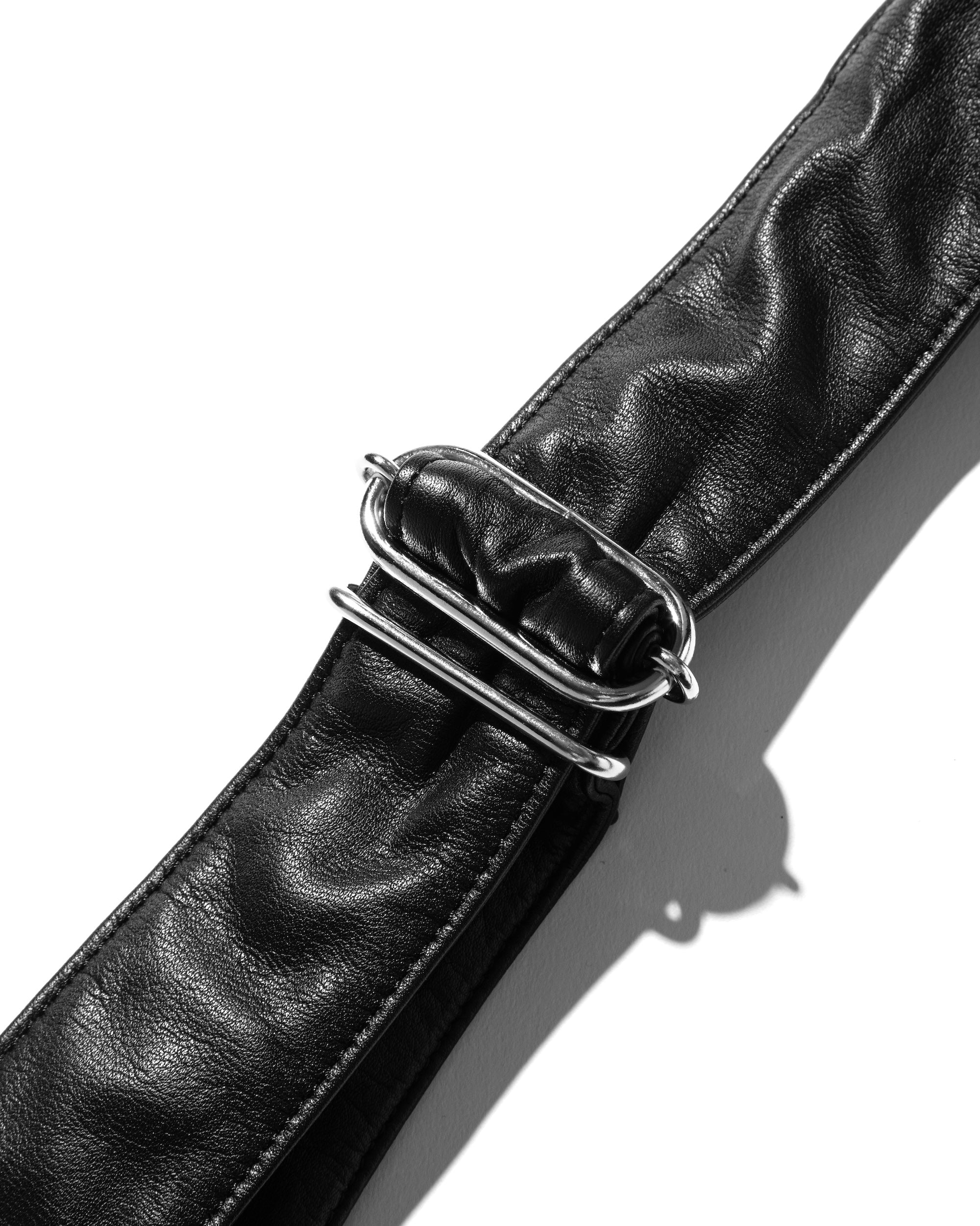 CLESSTE LEATHER PADDED FLAP HOLIDAY BAG