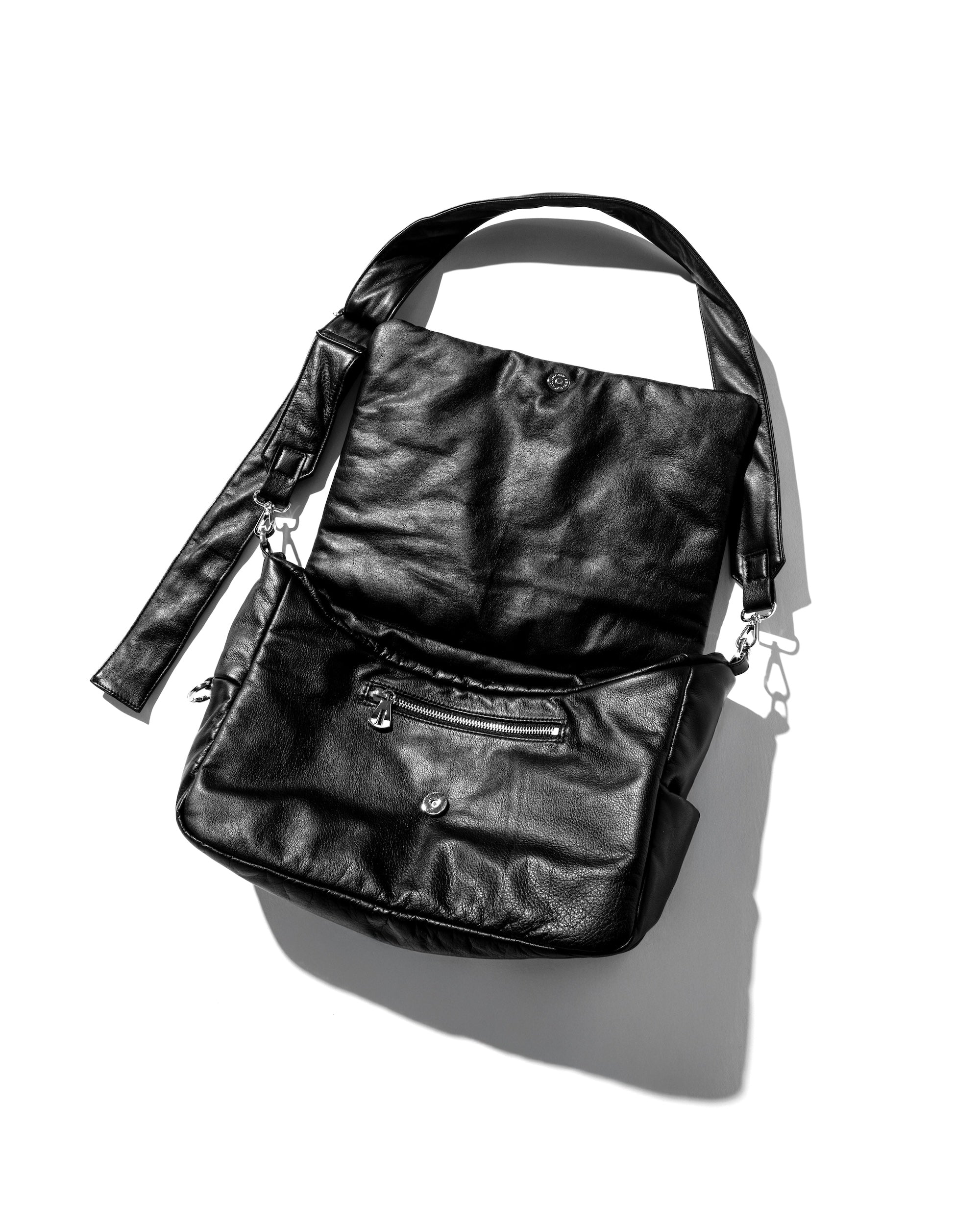 CLESSTE LEATHER PADDED FLAP HOLIDAY BAG