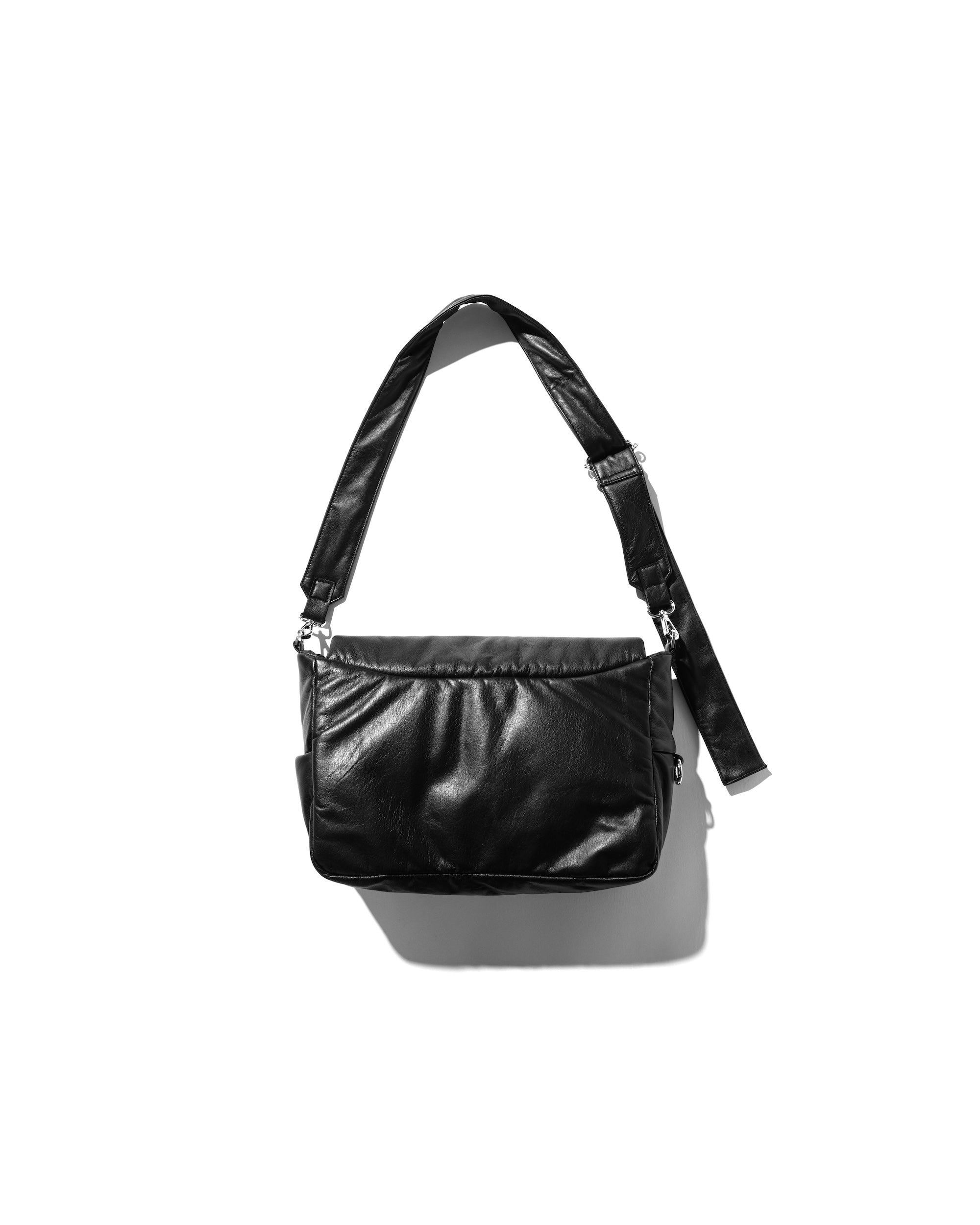 CLESSTE LEATHER PADDED FLAP HOLIDAY BAG