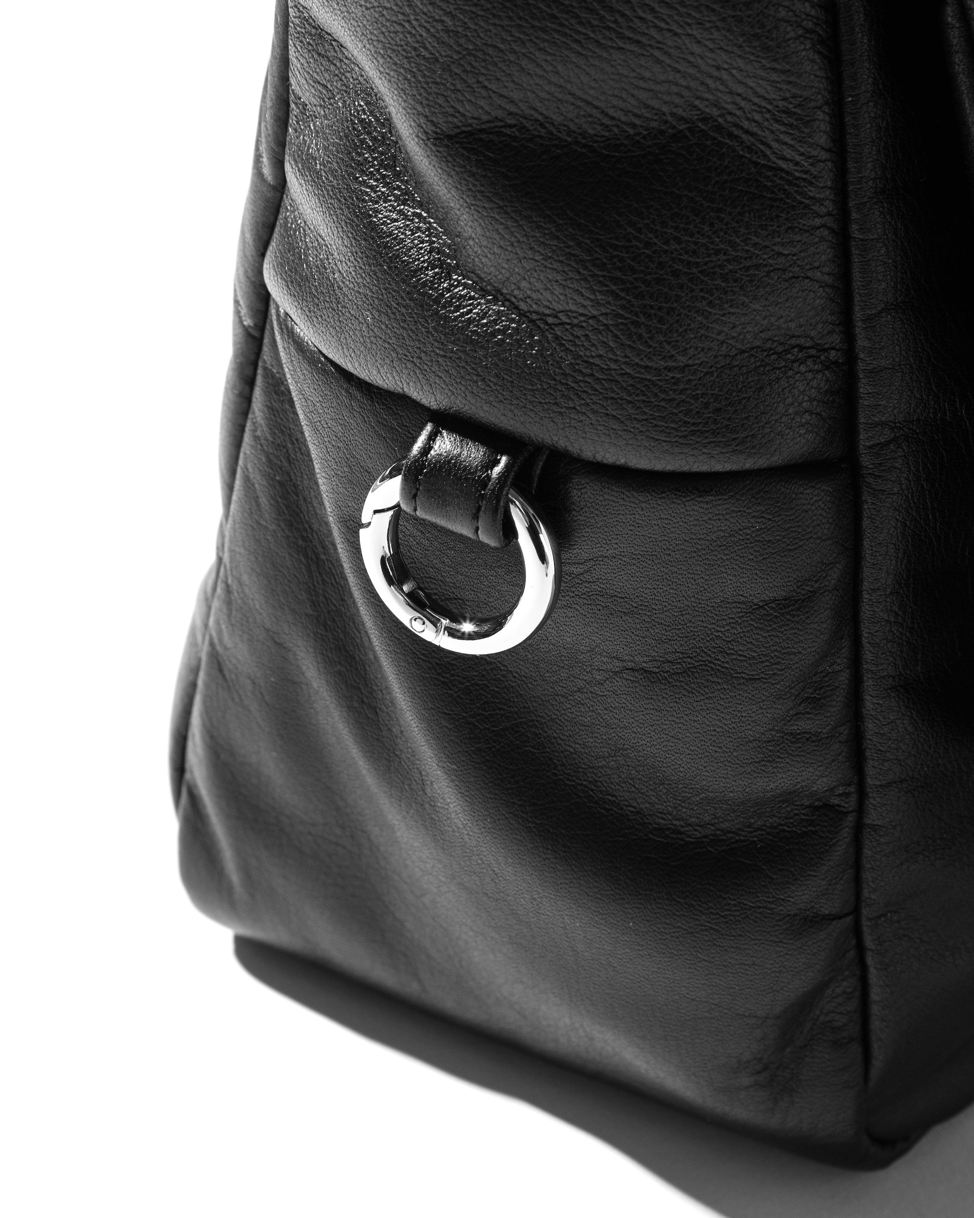 CLESSTE LEATHER PADDED FLAP HOLIDAY BAG