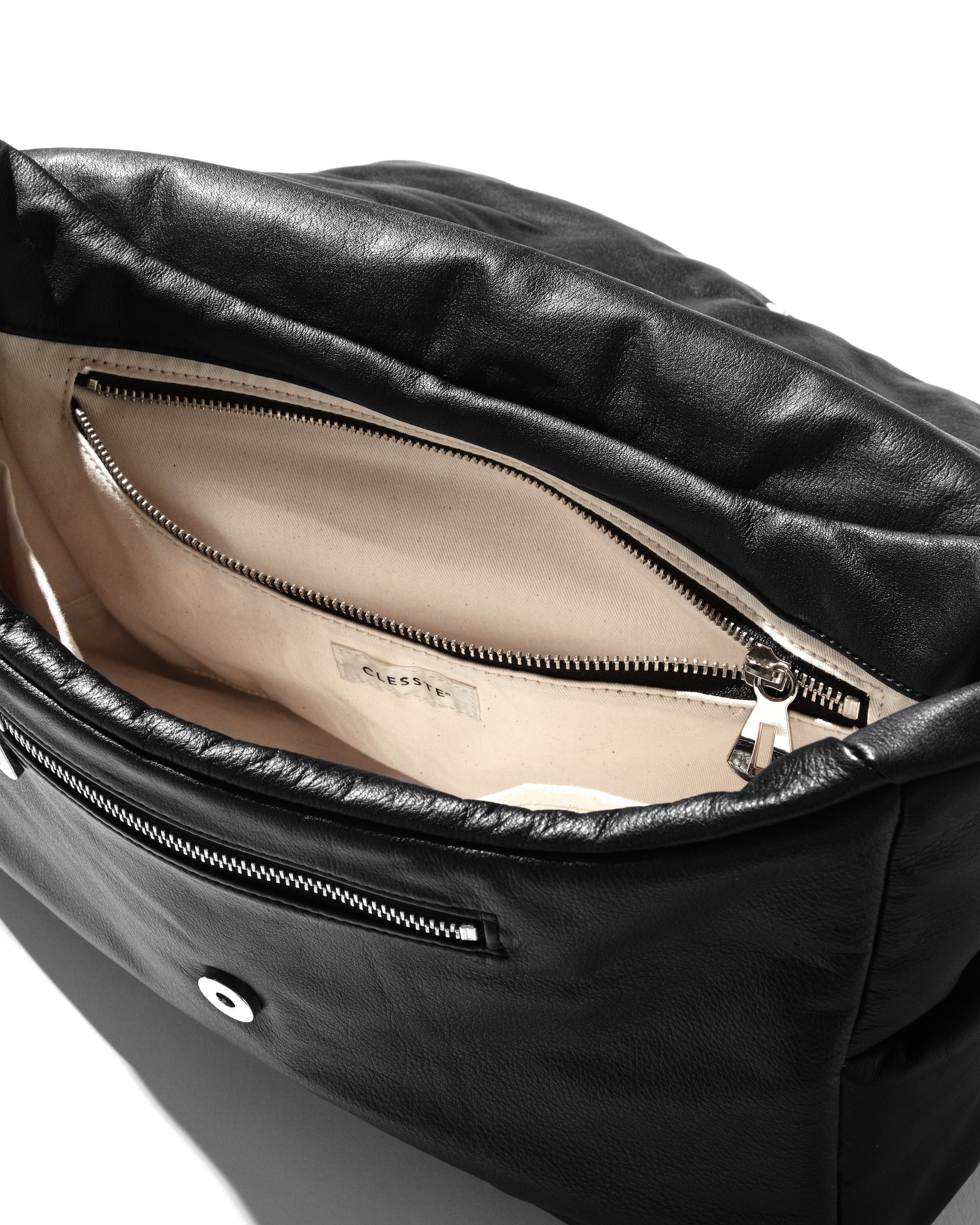 CLESSTE LEATHER PADDED FLAP HOLIDAY BAG