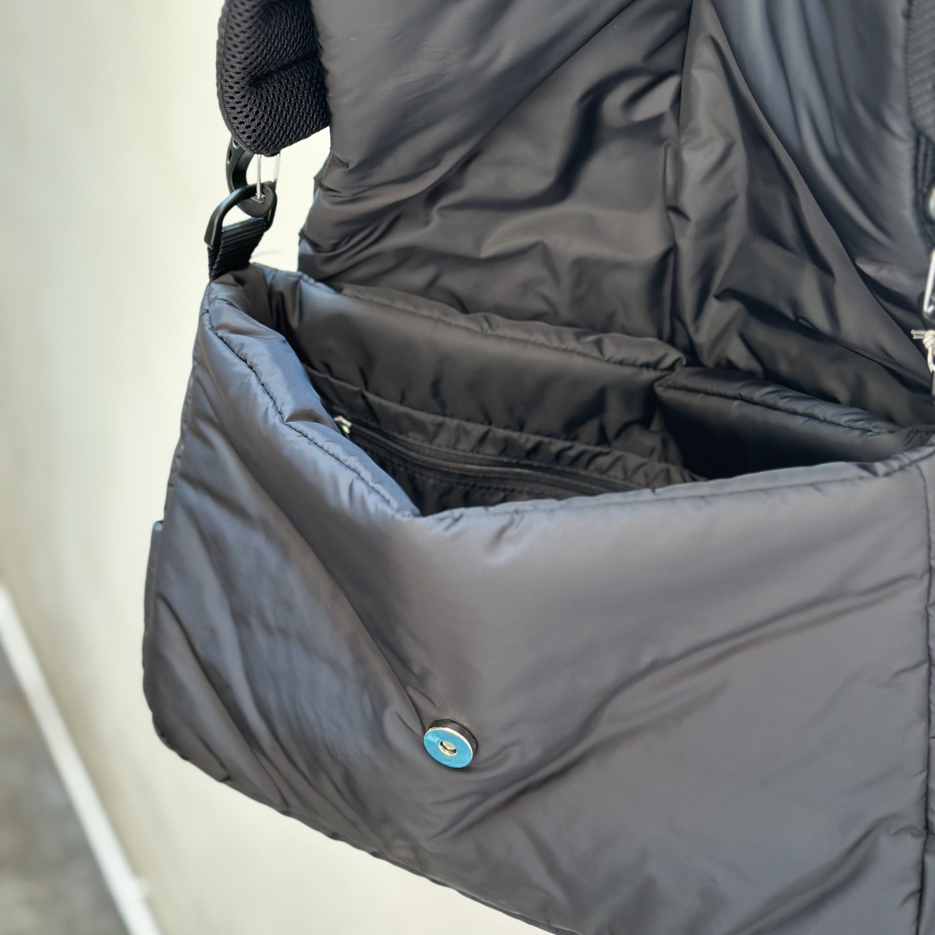 CLESSTE PADDED FLAP HOLIDAY BAG