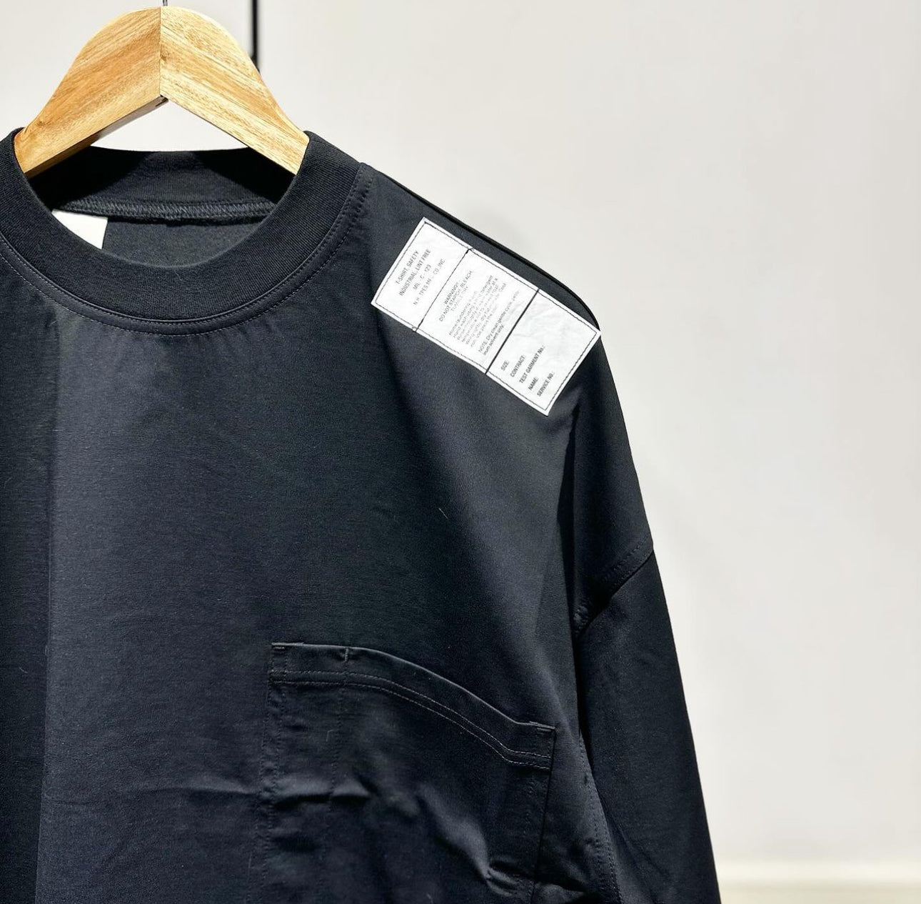 N.HOOLYWOOD TEST PRODUCT EXCHANGE SERVICE POCKET TEE