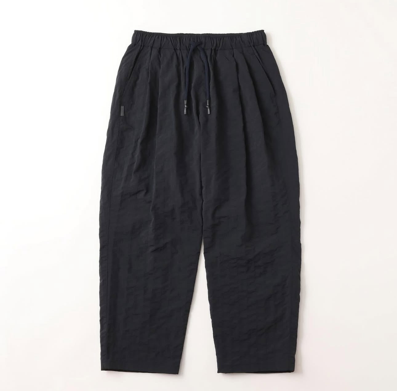 S.F.C 25FW NEW WIDE TWO TUCK PANTS (STITCHED NYLON)