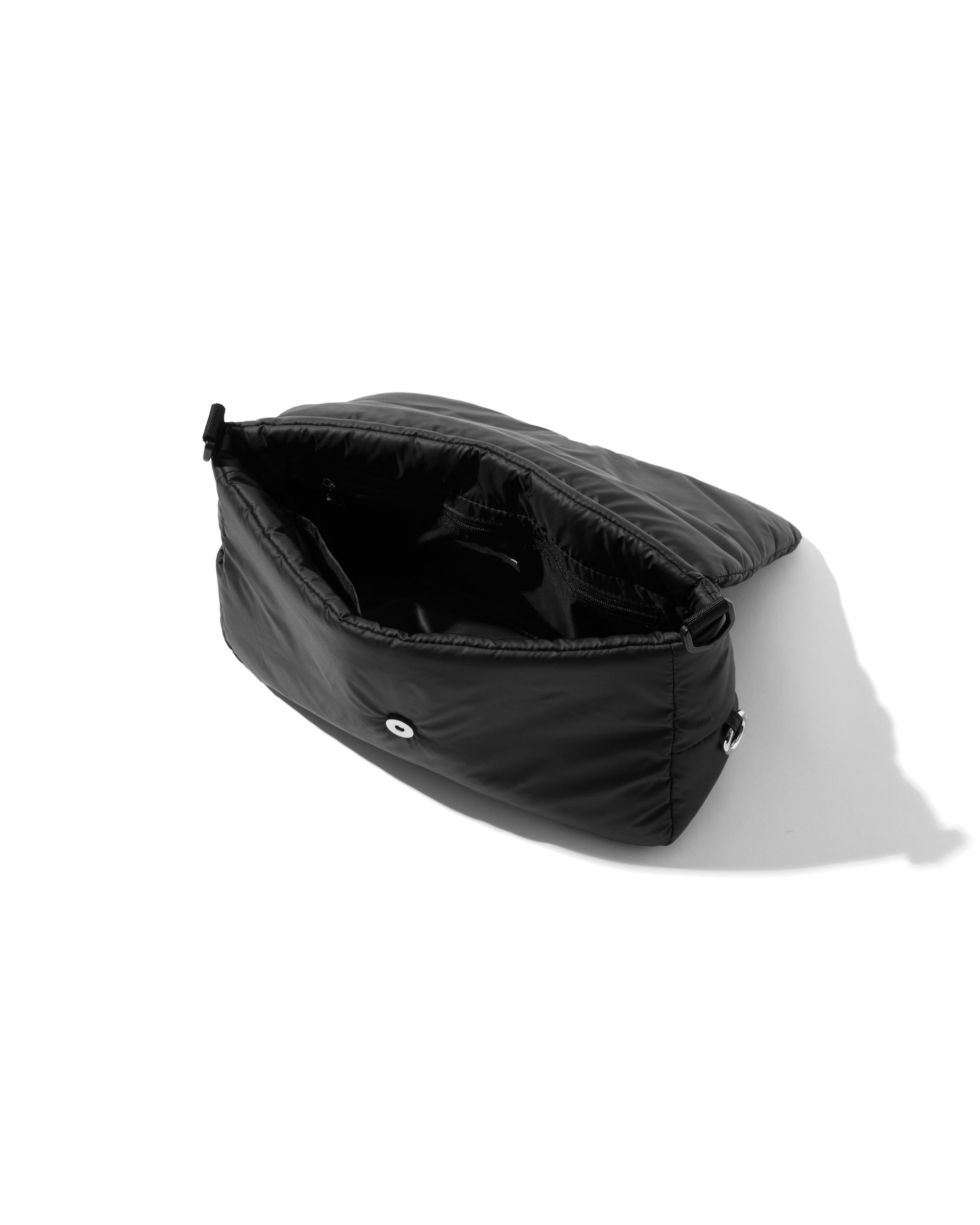 CLESSTE PADDED FLAP HOLIDAY BAG