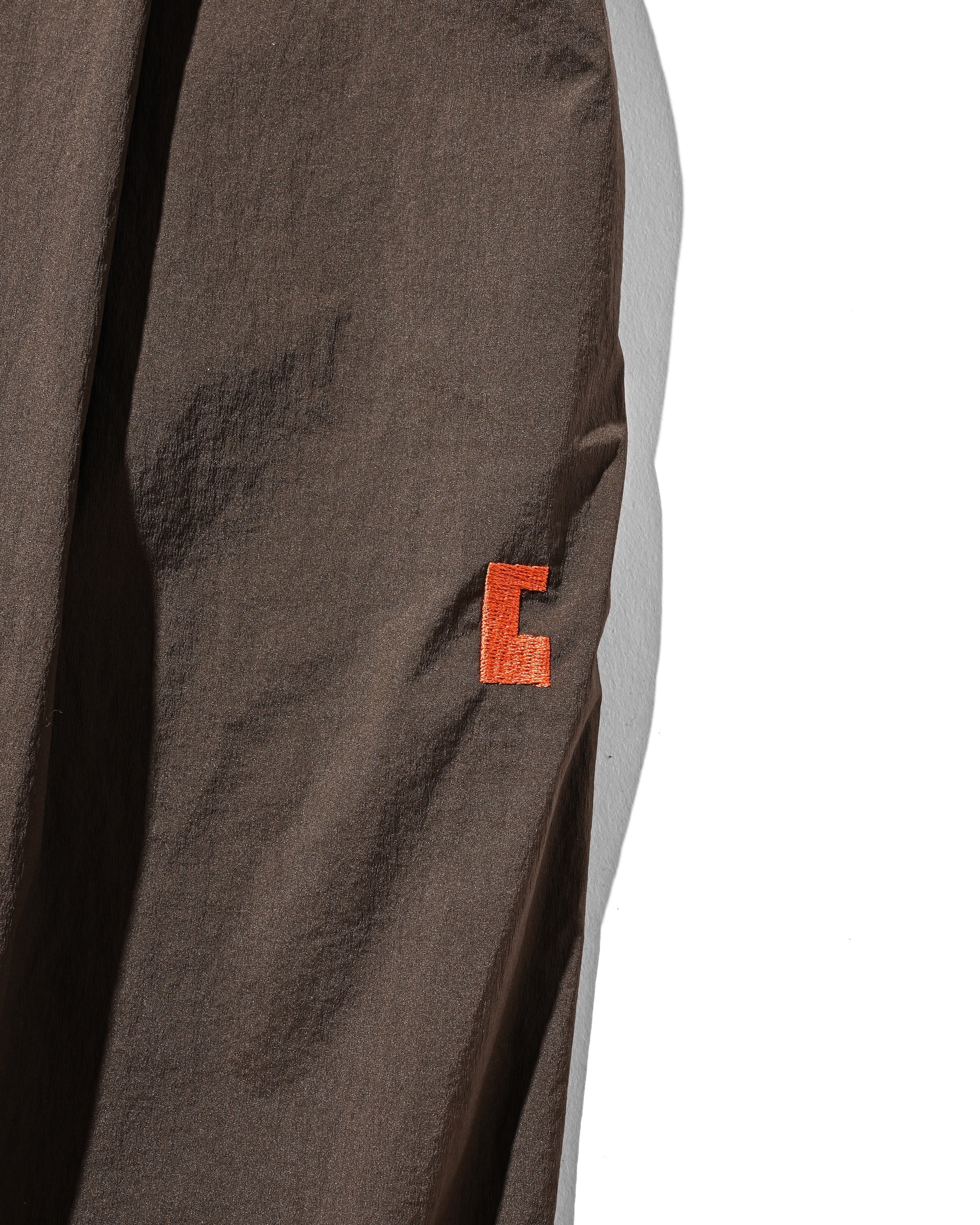 CLESSTE CRISPY NYLON CITY UNIFORM WIDE TAPERED PANTS