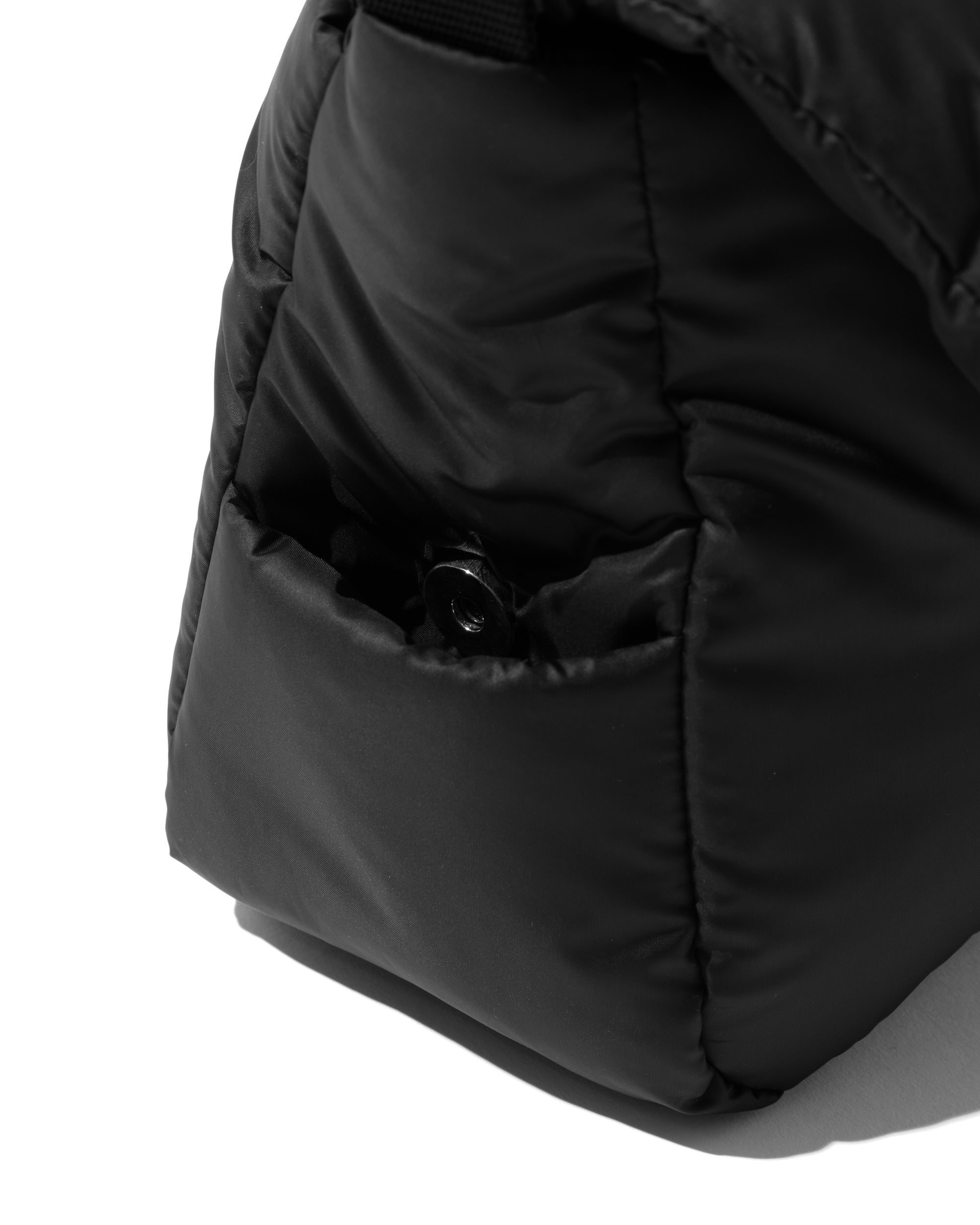 CLESSTE PADDED FLAP HOLIDAY BAG