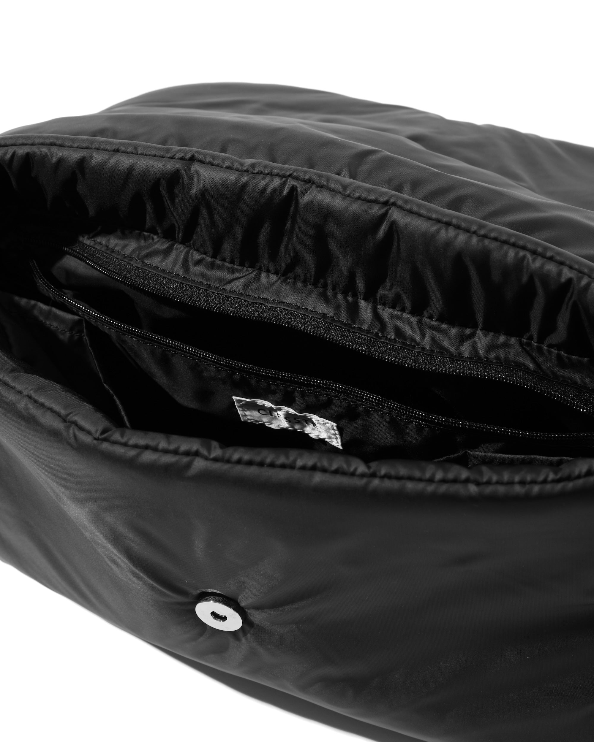 CLESSTE PADDED FLAP HOLIDAY BAG