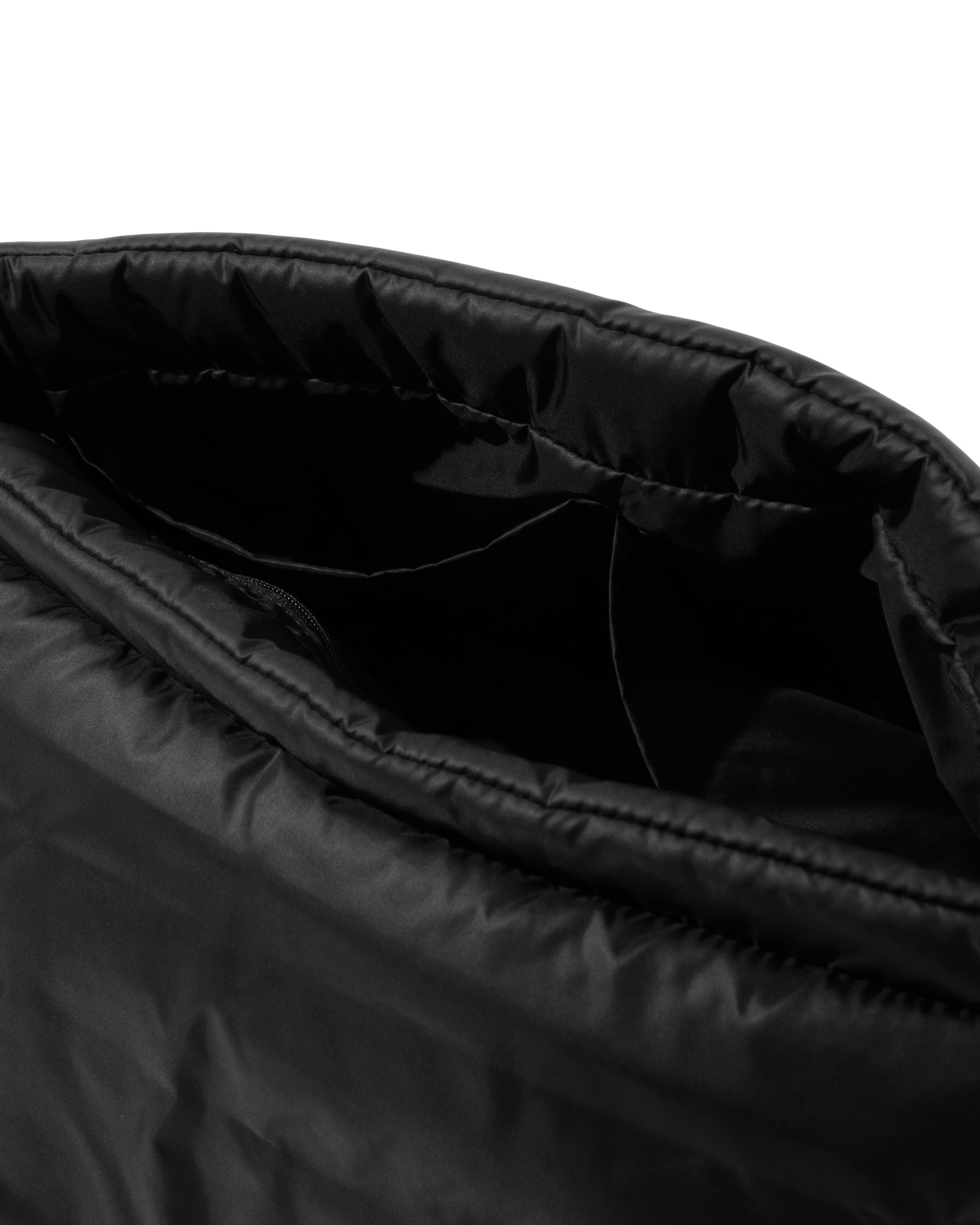 CLESSTE PADDED FLAP HOLIDAY BAG