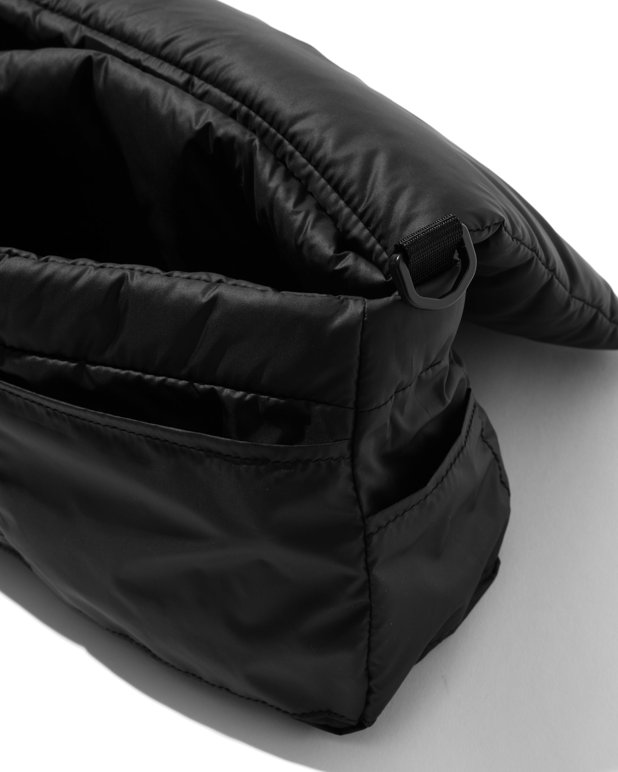 CLESSTE PADDED FLAP HOLIDAY BAG