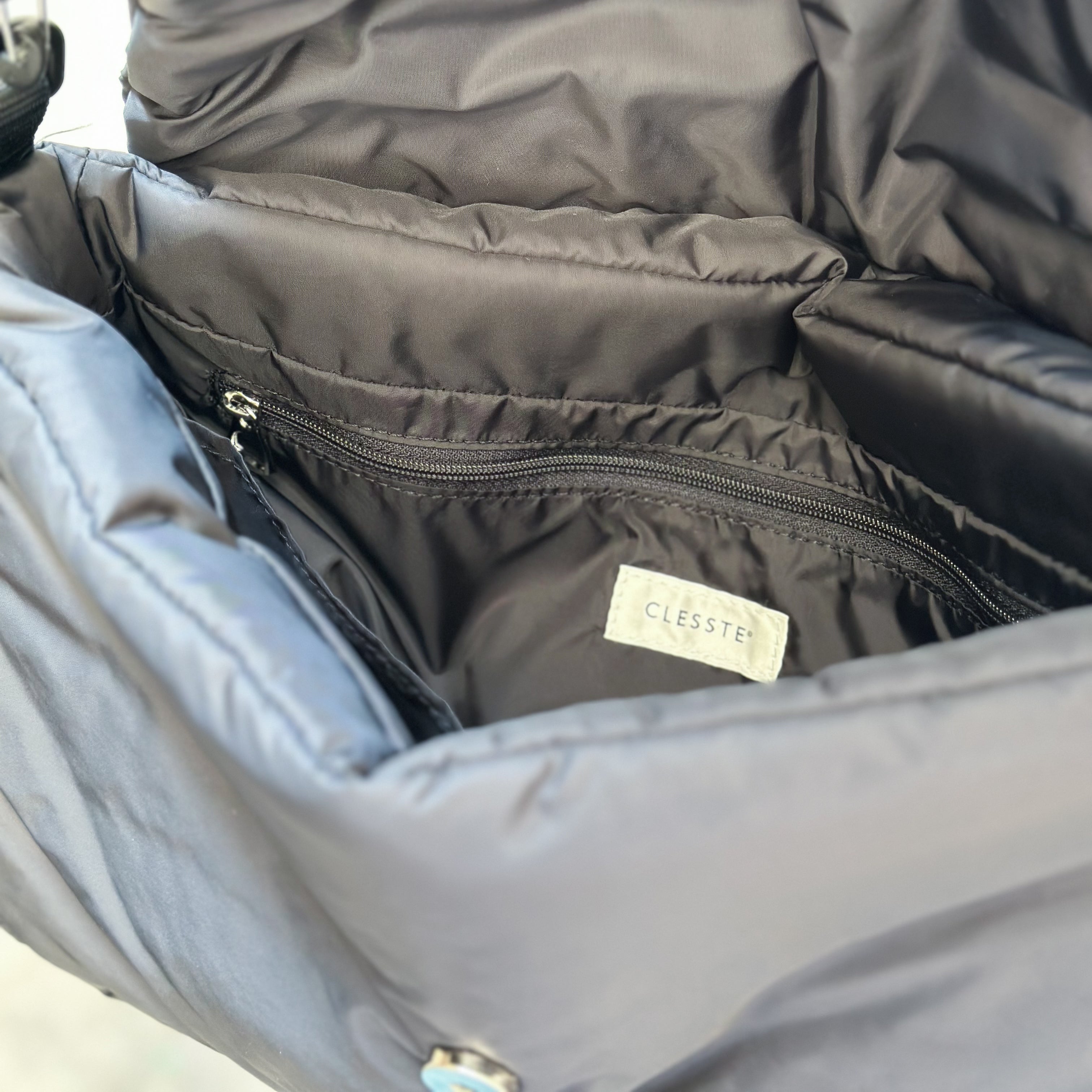 CLESSTE PADDED FLAP HOLIDAY BAG