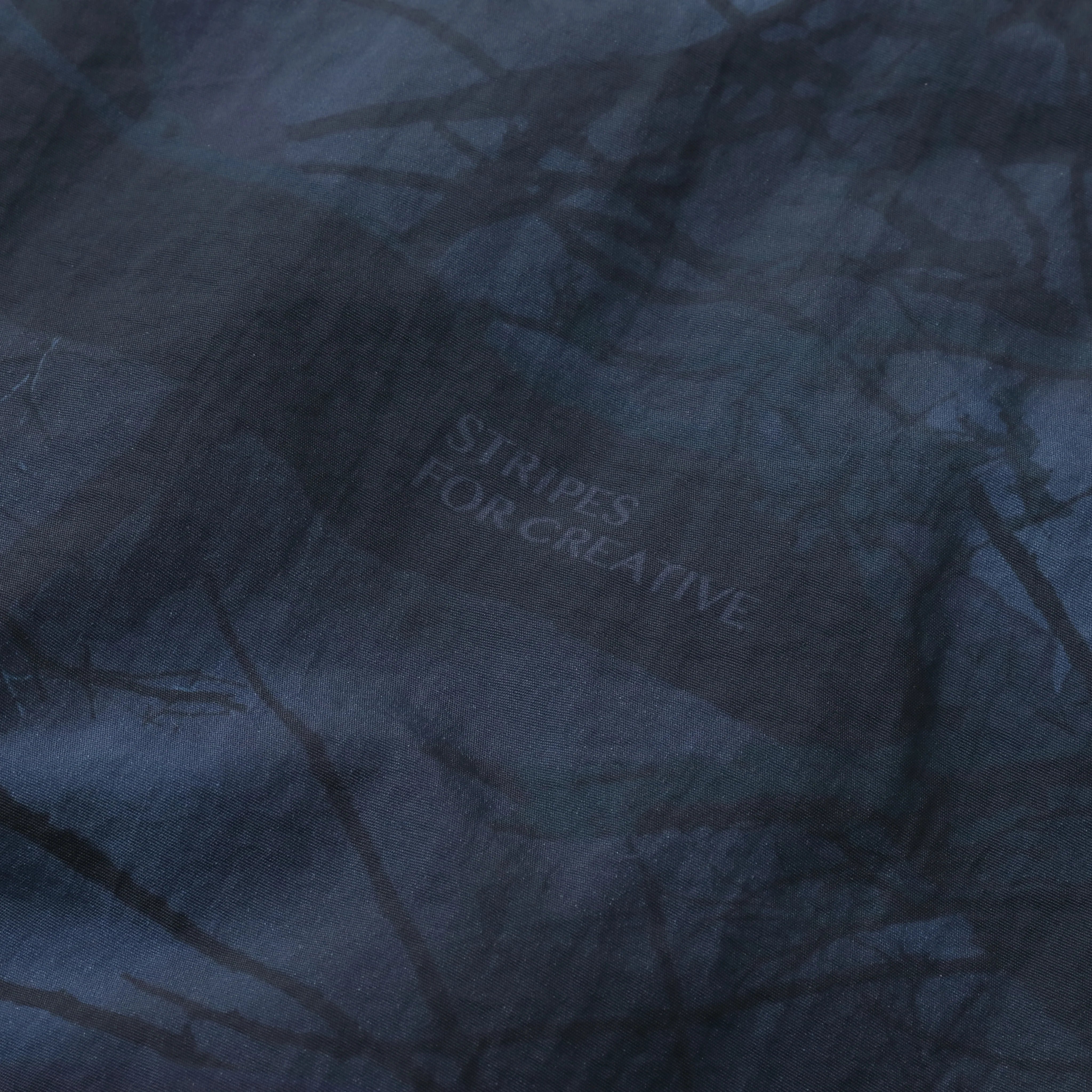 S.F.C 25FW WINDBREAKER JACKET (REAL TREE CAMO)