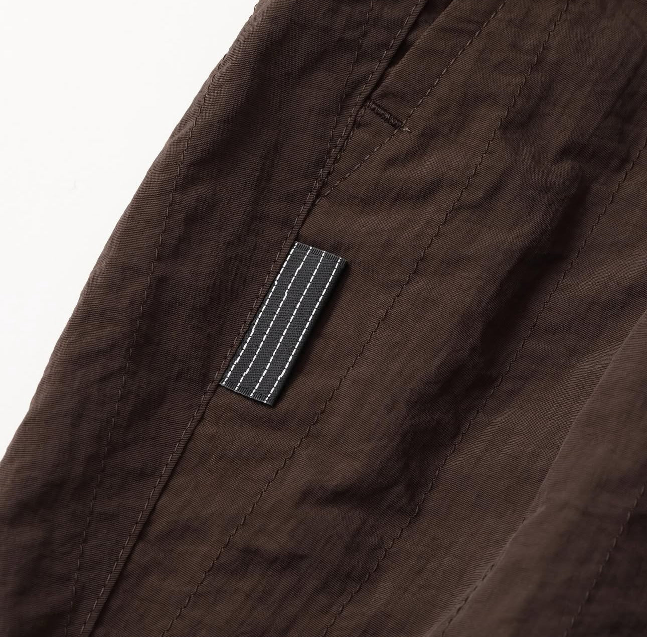 S.F.C 25FW NEW WIDE TWO TUCK PANTS (STITCHED NYLON)