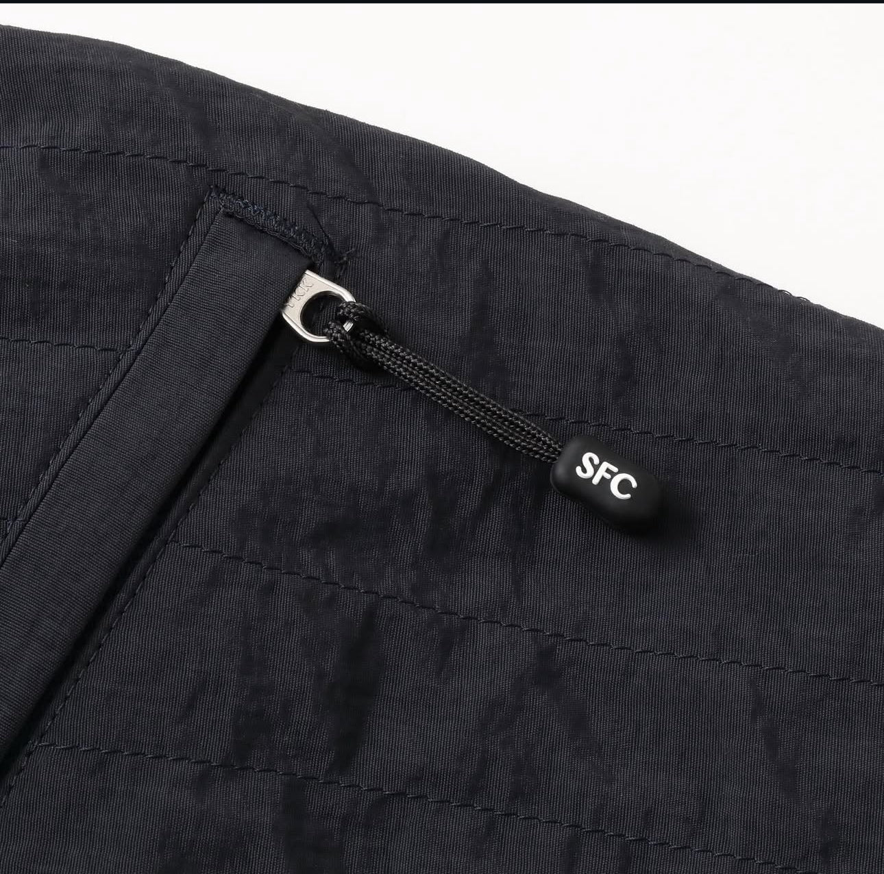 S.F.C 25FW NEW WIDE TWO TUCK PANTS (STITCHED NYLON)